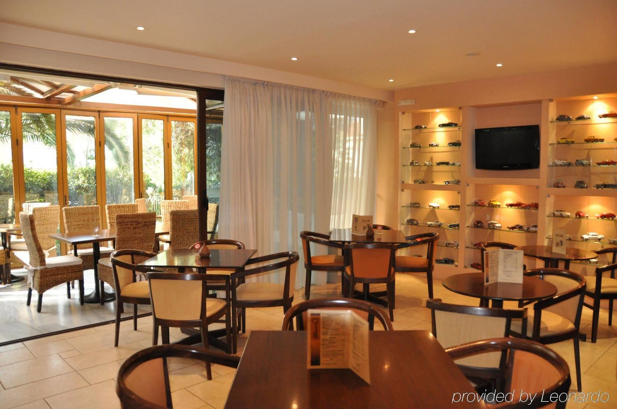 Hotel Chris Athen Restaurant bilde
